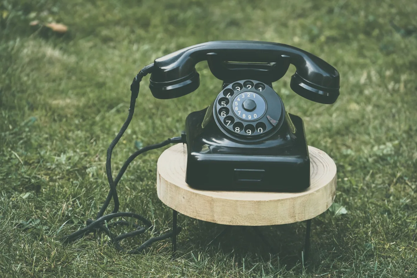 A telephone handset resting on a table