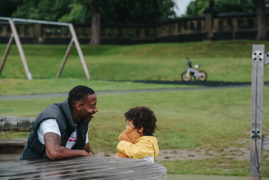 A parent and child together